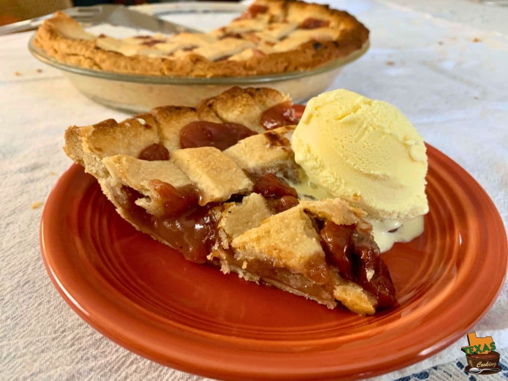 Grandma's Cherry Pie with a scoop of vanilla ice cream